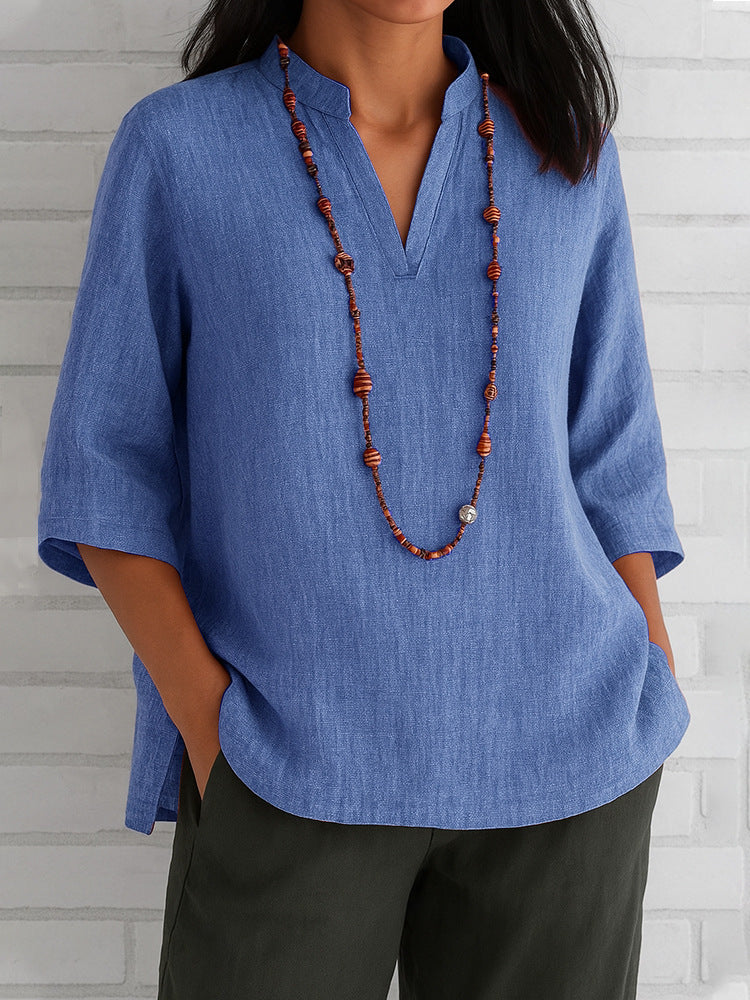 Nuevo estilo de verano: camisa informal holgada de algodón y lino con cuello en V y manga tres cuartos.