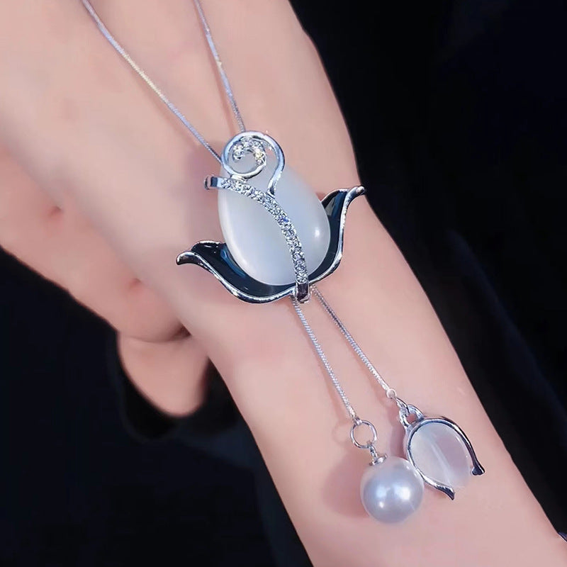 💝【Kup 1, a 1 dostaniesz gratis】✨Długi naszyjnik z różą w kształcie kociego oka
