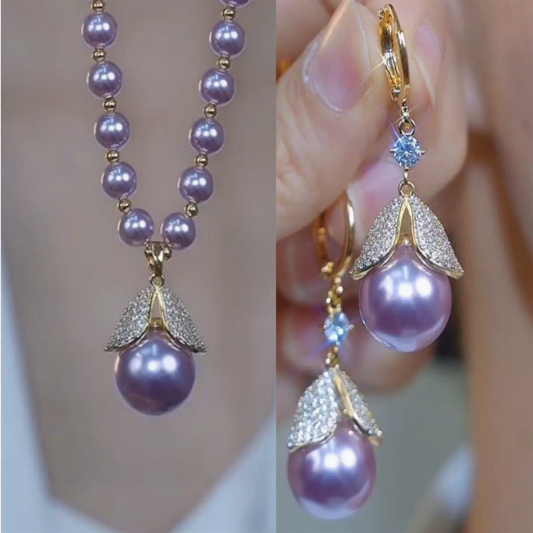 🔥【Kúp 1 a 1 dostaneš zadarmo】Nové náušnice s perlovým príveskom na jeseň/zimu