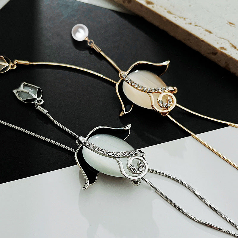 💝【Kup 1, a 1 dostaniesz gratis】✨Długi naszyjnik z różą w kształcie kociego oka