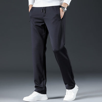 👖【L–8XL】🔥 Męskie letnie spodnie biznesowe z jedwabiu lodowego – elastyczny pas, odpowiednie dla osób o wadze 45–135 kg – cena specjalna