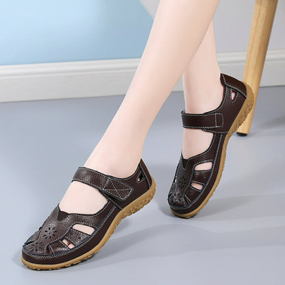 👡【Velikosti 36-42】Ženski elegantni in udobni ravni ortopedski sandali, izdelani iz mehkega pravega usnja, udobni in zračni.