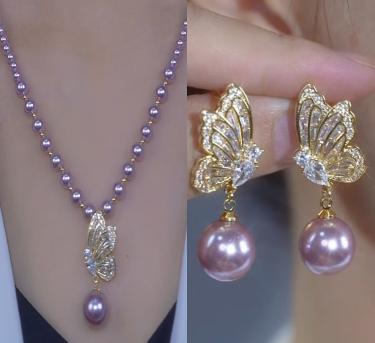 🔥【Kúp 1 a 1 dostaneš zadarmo】Nové náušnice s perlovým príveskom na jeseň/zimu