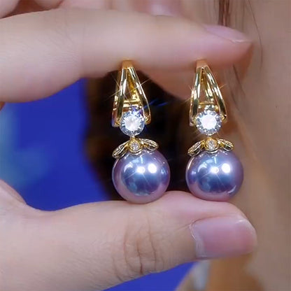 💋【Compre uno y llévese otro gratis】 Pendientes de plata con perlas de lujo francés de nuevo estilo 2025