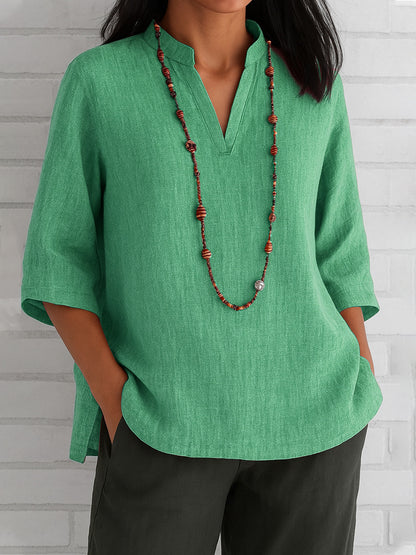 Nuevo estilo de verano: camisa informal holgada de algodón y lino con cuello en V y manga tres cuartos.