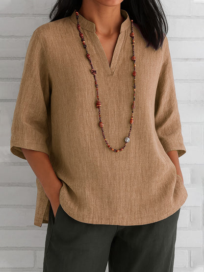 Nuevo estilo de verano: camisa informal holgada de algodón y lino con cuello en V y manga tres cuartos.