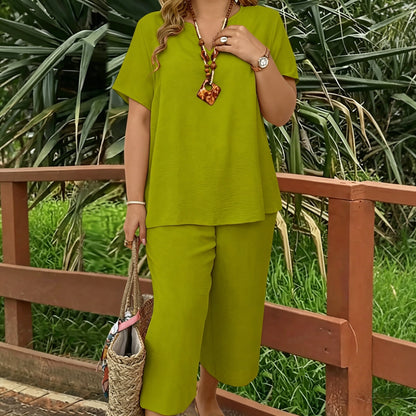 【X-5XL】💗 Elegancki i stylowy zestaw plus size: jednokolorowa bluzka z dekoltem w serek i krótkim rękawem oraz spodnie z szerokimi nogawkami.